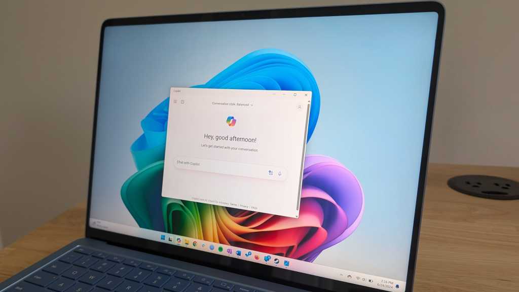 Microsoft Surface Laptop with Copilot app on screen